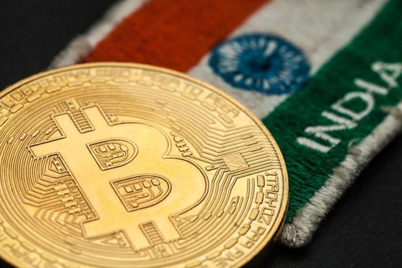Bitcoin with Indian flag in background