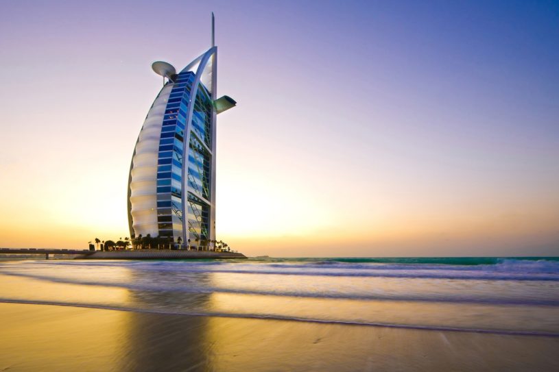 Architecture in Dubai with sun setting in background