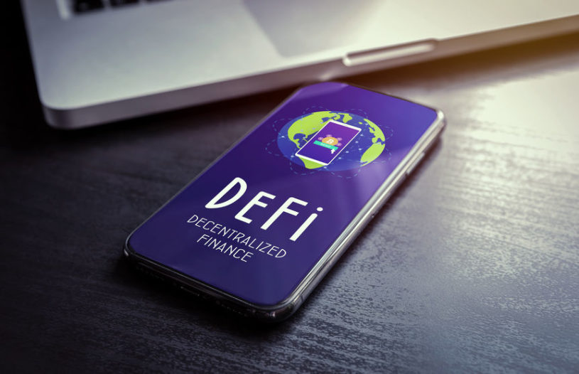 Sartphone with purple screen that says "Decentralized Finance"
