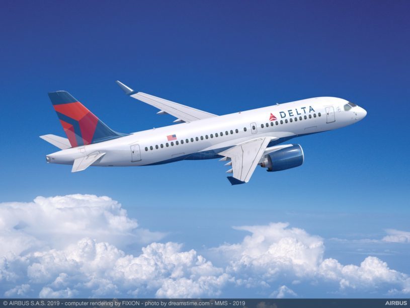 Delta Airbus flying in the sky with blue sky and clouds in background