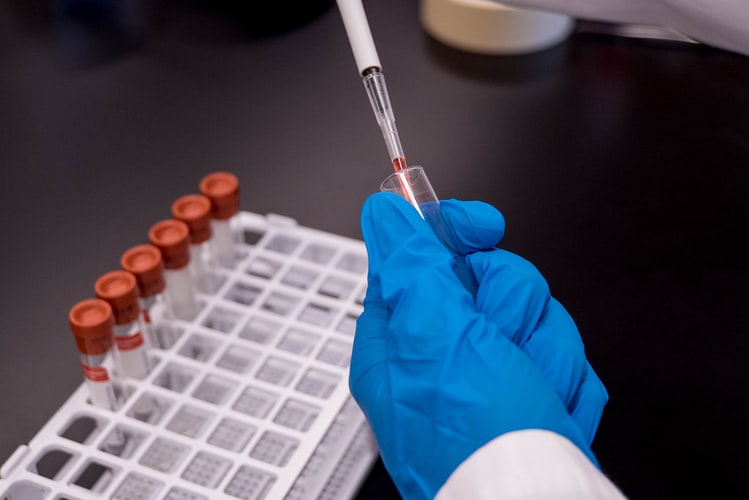 Lab worker developing a COVID-19 vaccine.