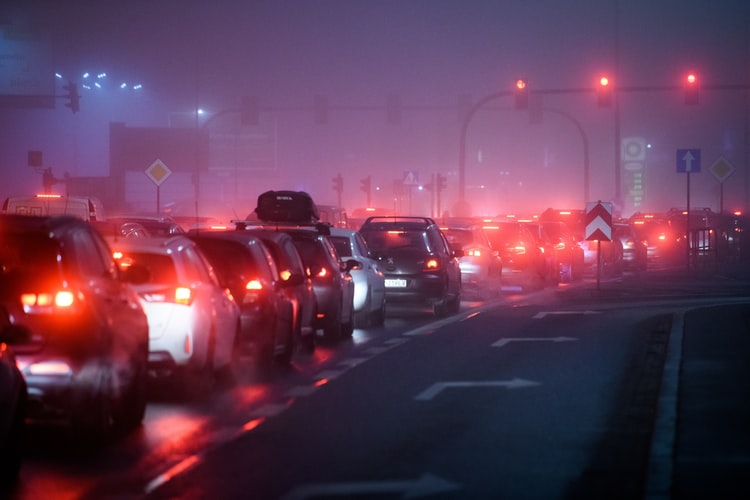 Cars lined up in a traffic jam signifying the congestion of the Ethereum blockchain.