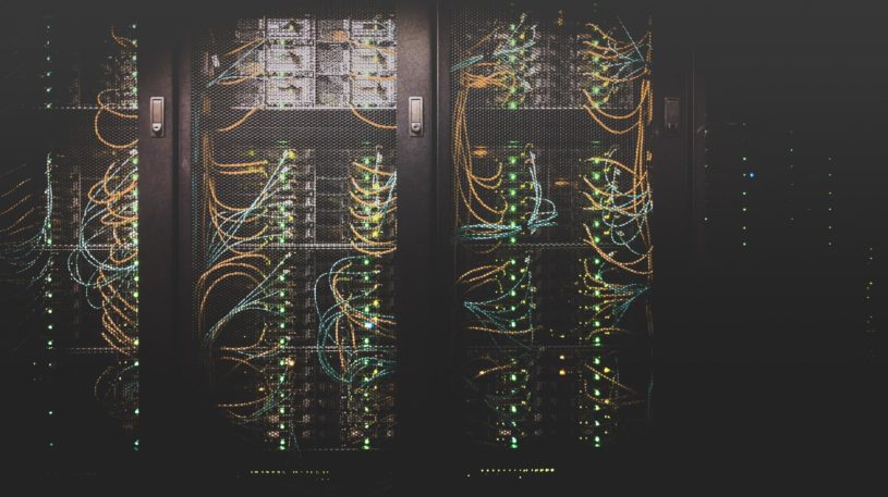 Servers in an air conditioned server room, depicting software which powers the top tech stocks
