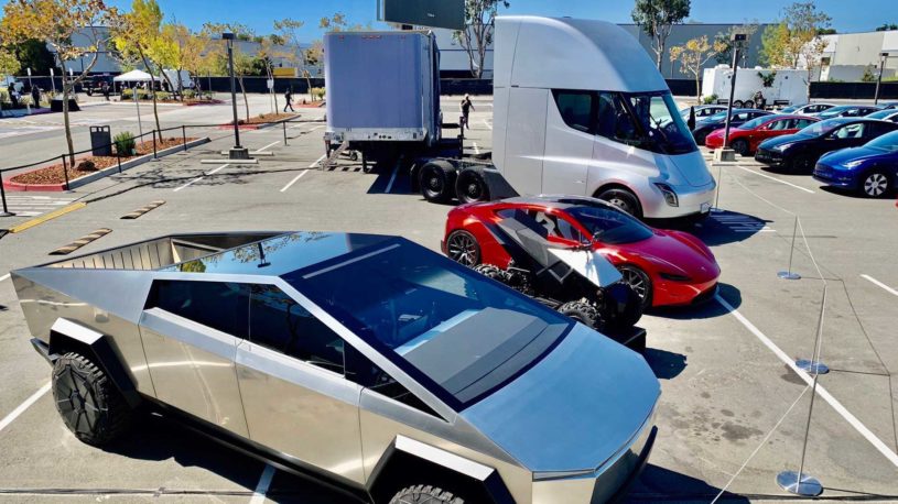Tesla vehicles at Tesla's battery day signifying one of the top stocks to buy