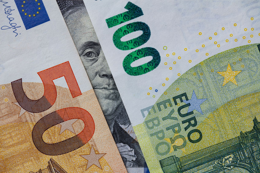 Benjamin Franklin peeking through euro banknotes