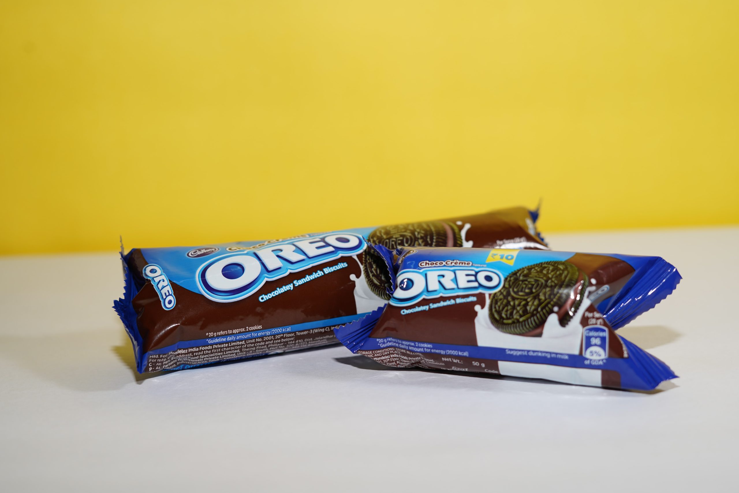 Two packs of Oreo biscuits.