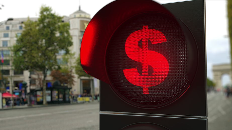 Dollar sign on red traffic light signal. Forex related conceptual 3D rendering
