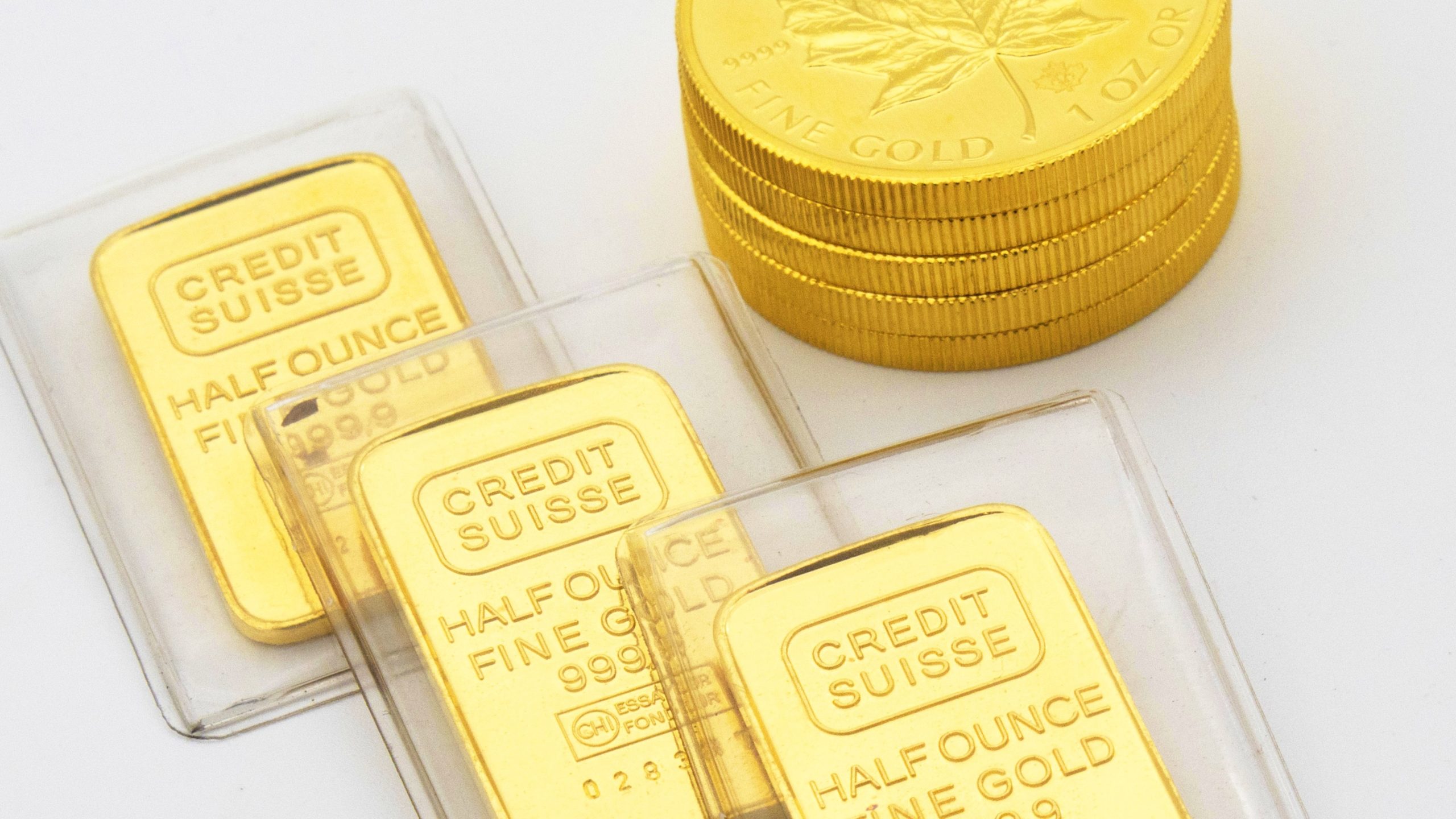 Three half-ounce gold bullions.