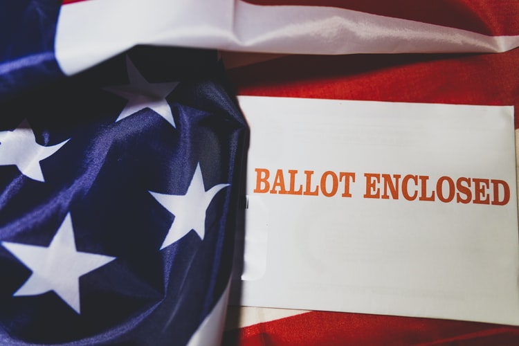 American flag around a ballot.