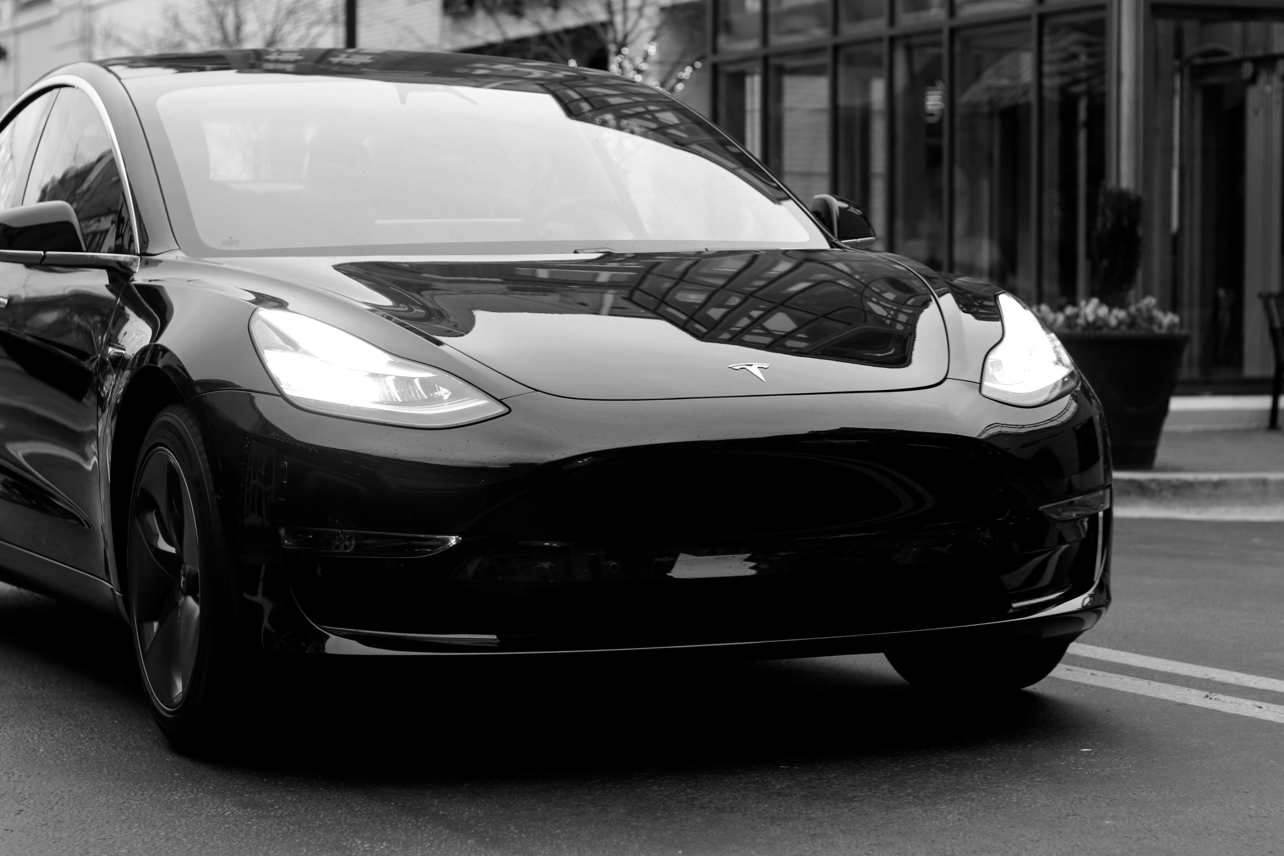 Tesla car in classy black and white photo.