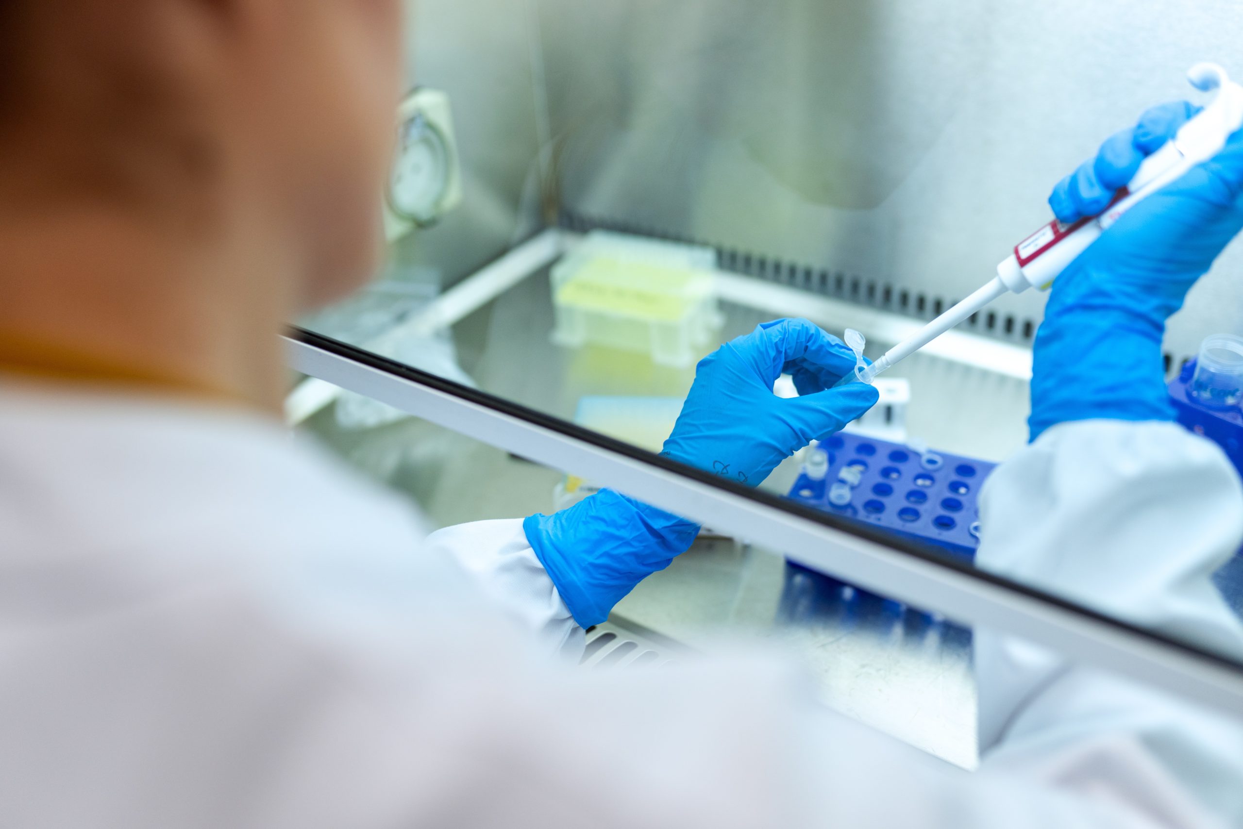 Biomedical engineer working in a lab.