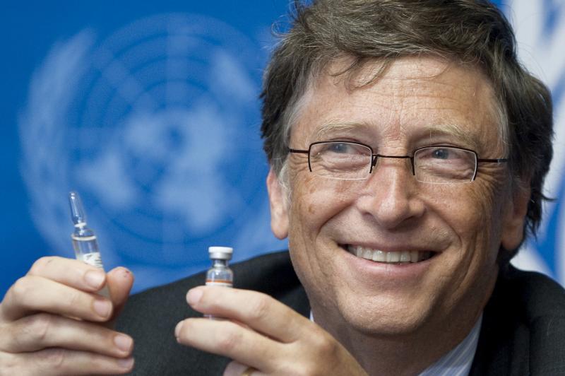 Bill Gates holding vaccine ampules at UN conference.