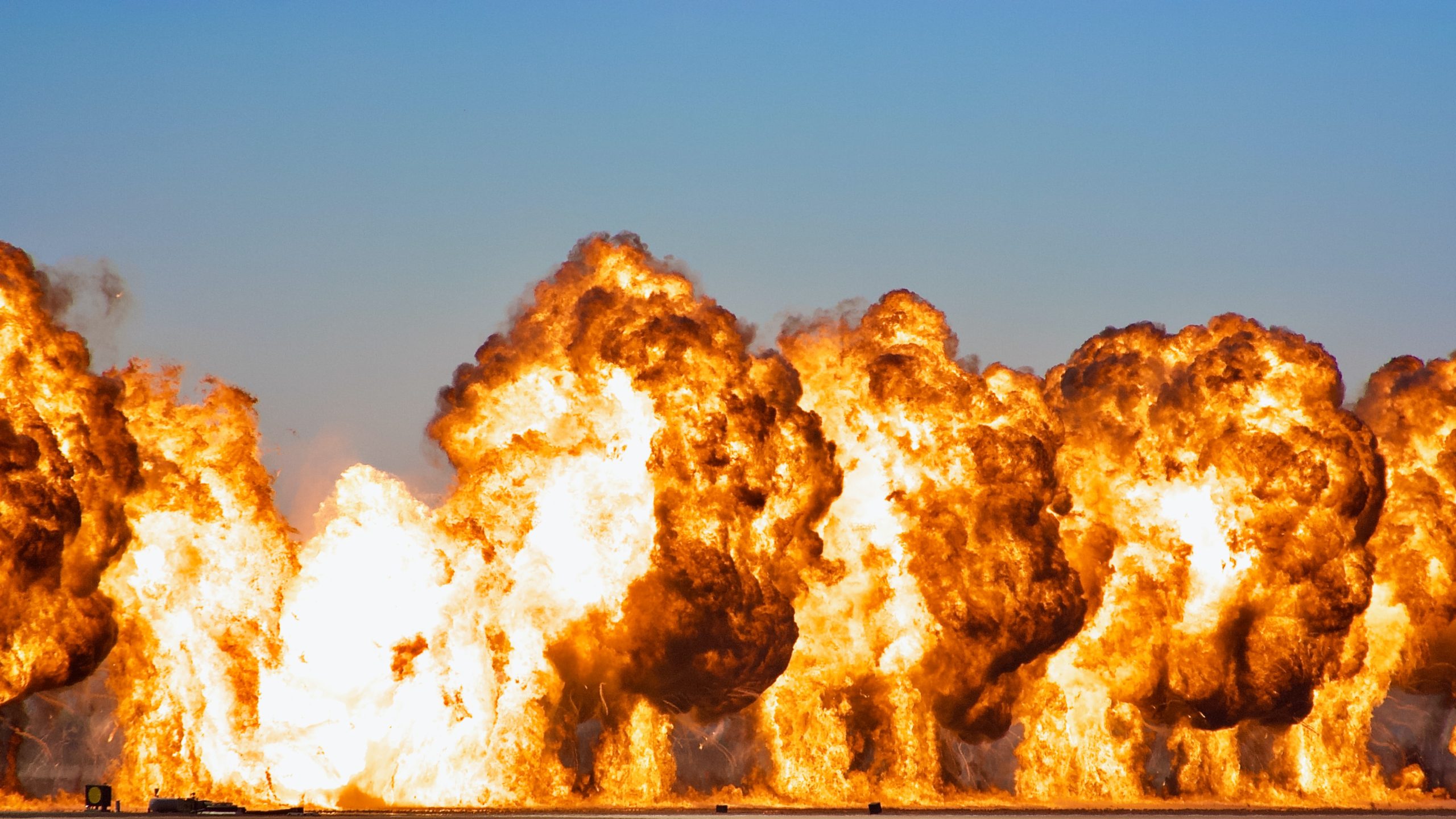 Several large fiery explosions signaling the price of ETH if gas fees decrease with EIP 1559.