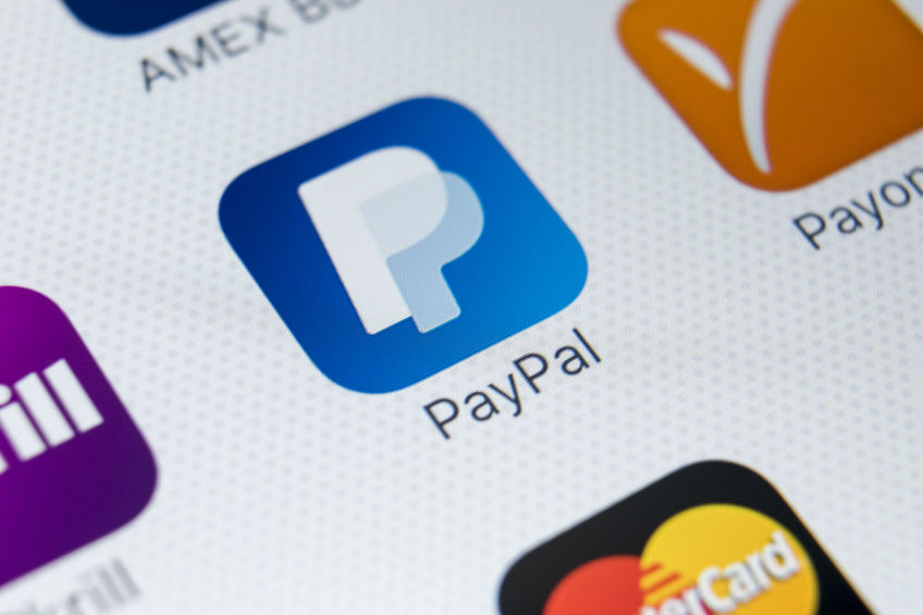 PayPal app icon on an iPhone, with Payoneer and Mastercard also showing