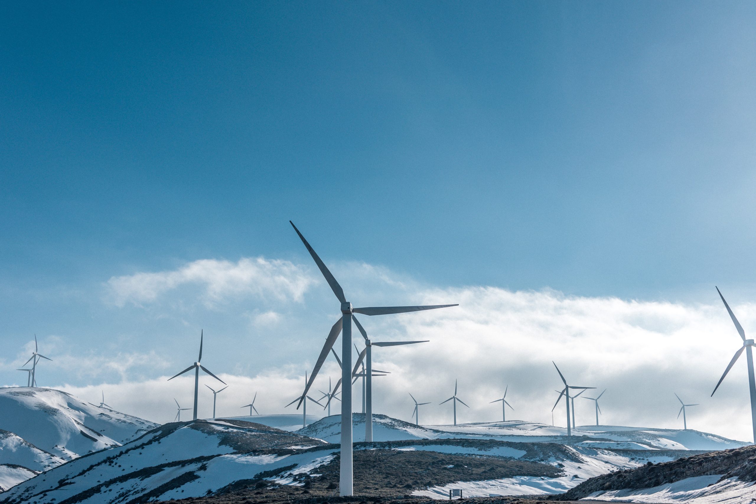 Windmills on a mountain range.