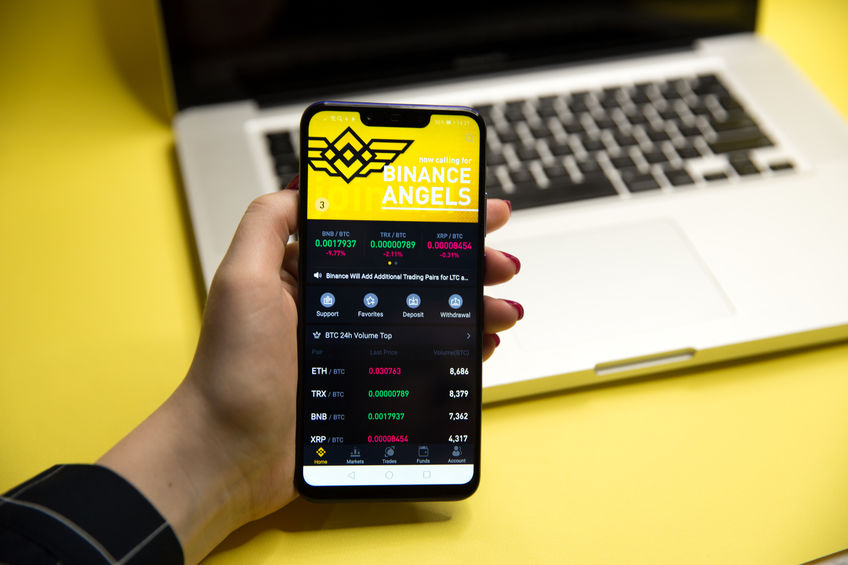 Binance digital asset trading app open on a smartphone, used for Binance Stock Tokens.
