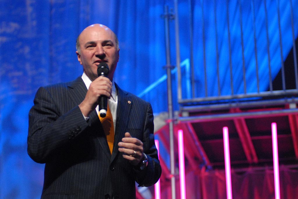 Kevin O'Leary speaking at a public event.