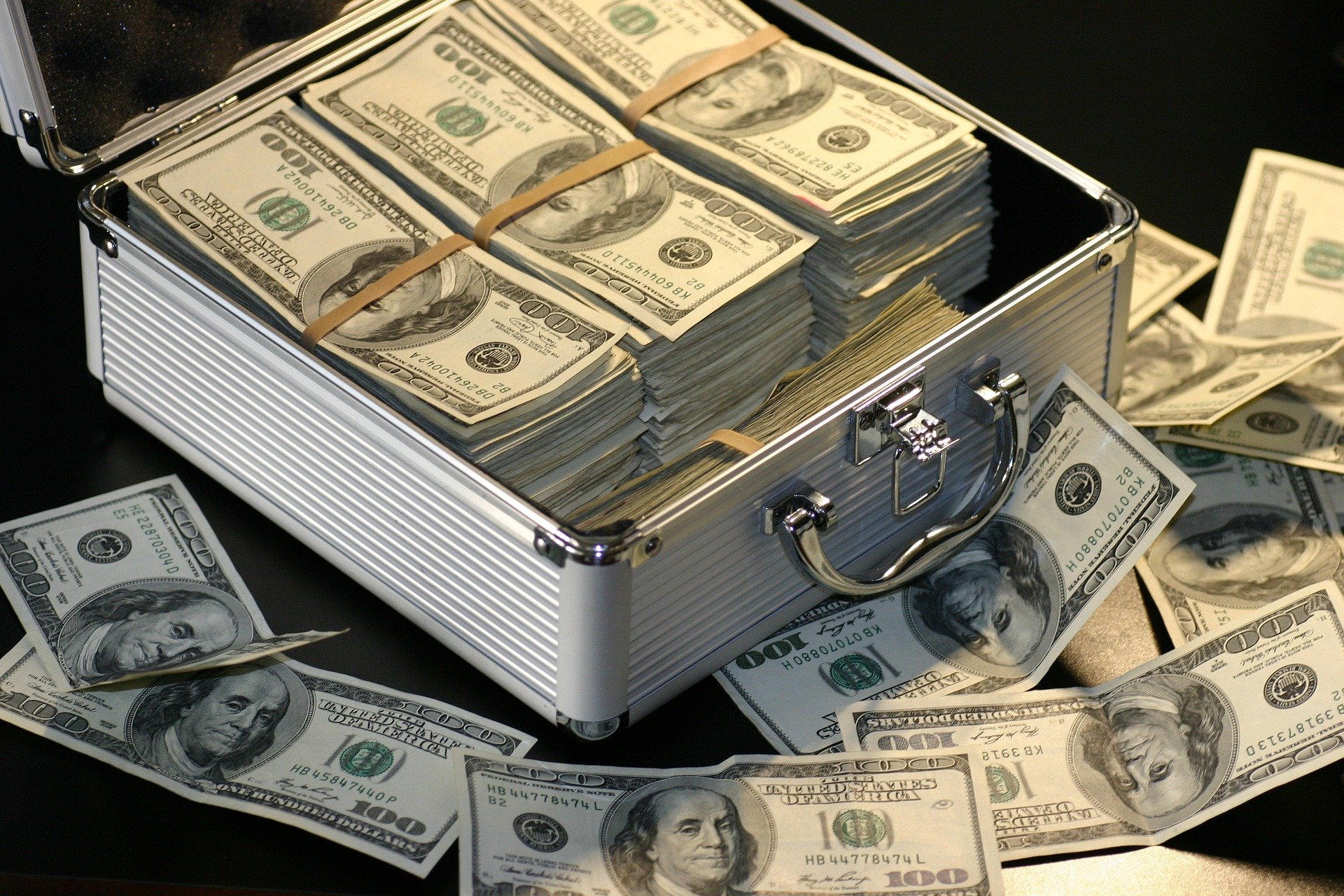 Case full of USD bills.