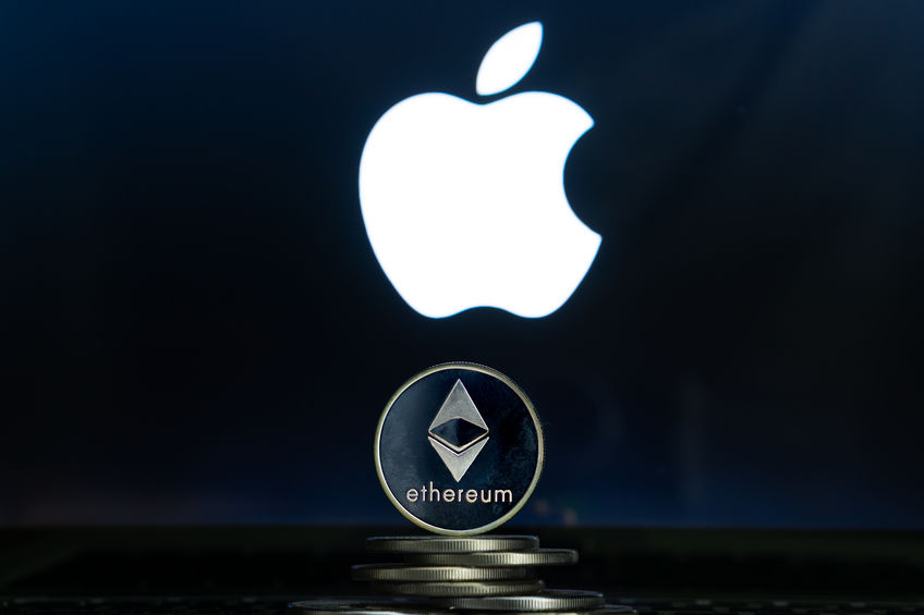 Ethereum coins with Apple logo on a laptop screen. Slovenia, Ljubljana - 02 24 2019