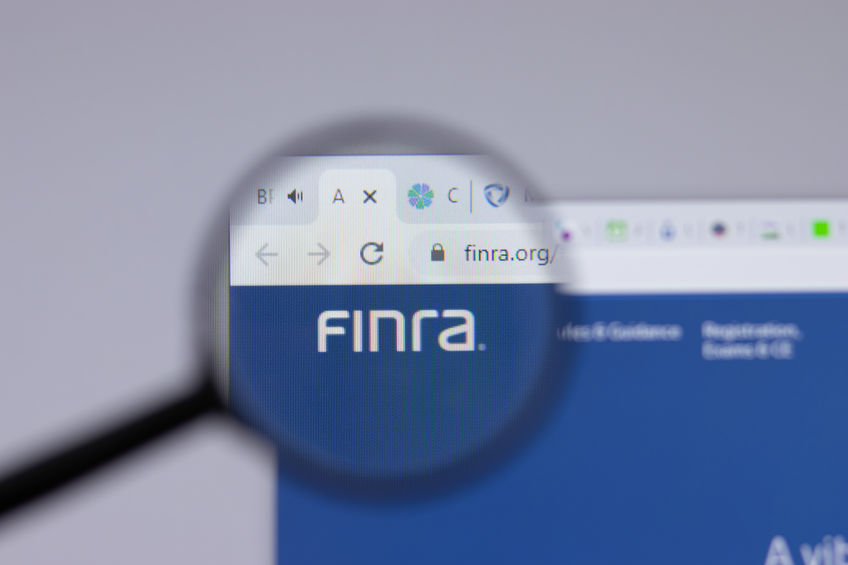 Financial Industry Regulatory Authority FINRA logo close-up on website page, Illustrative Editorial