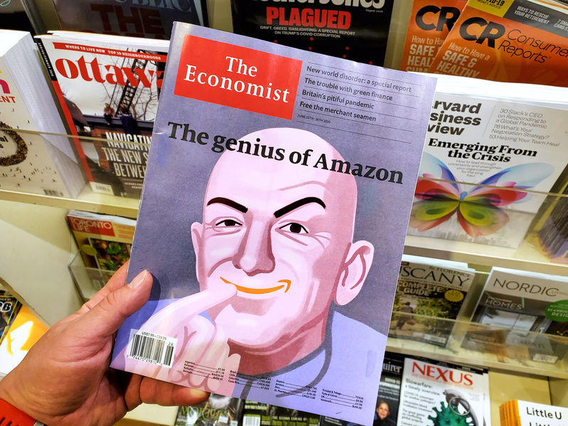 The genius of Amazon title and a picture of Jeff Bezos as the Dr Evil on The Economist newspaper in a hand over a stack of magazines.