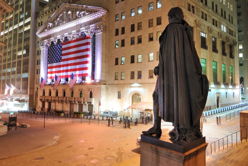 behind the george washington statue looking towards the new york stock exchange on wall street may 26, 2010 in new york, ny.