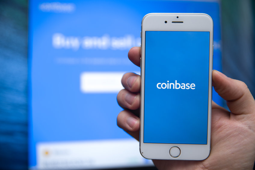 Buy Bitcoin and More, Secure Wallet mobile app on the display of smartphone.