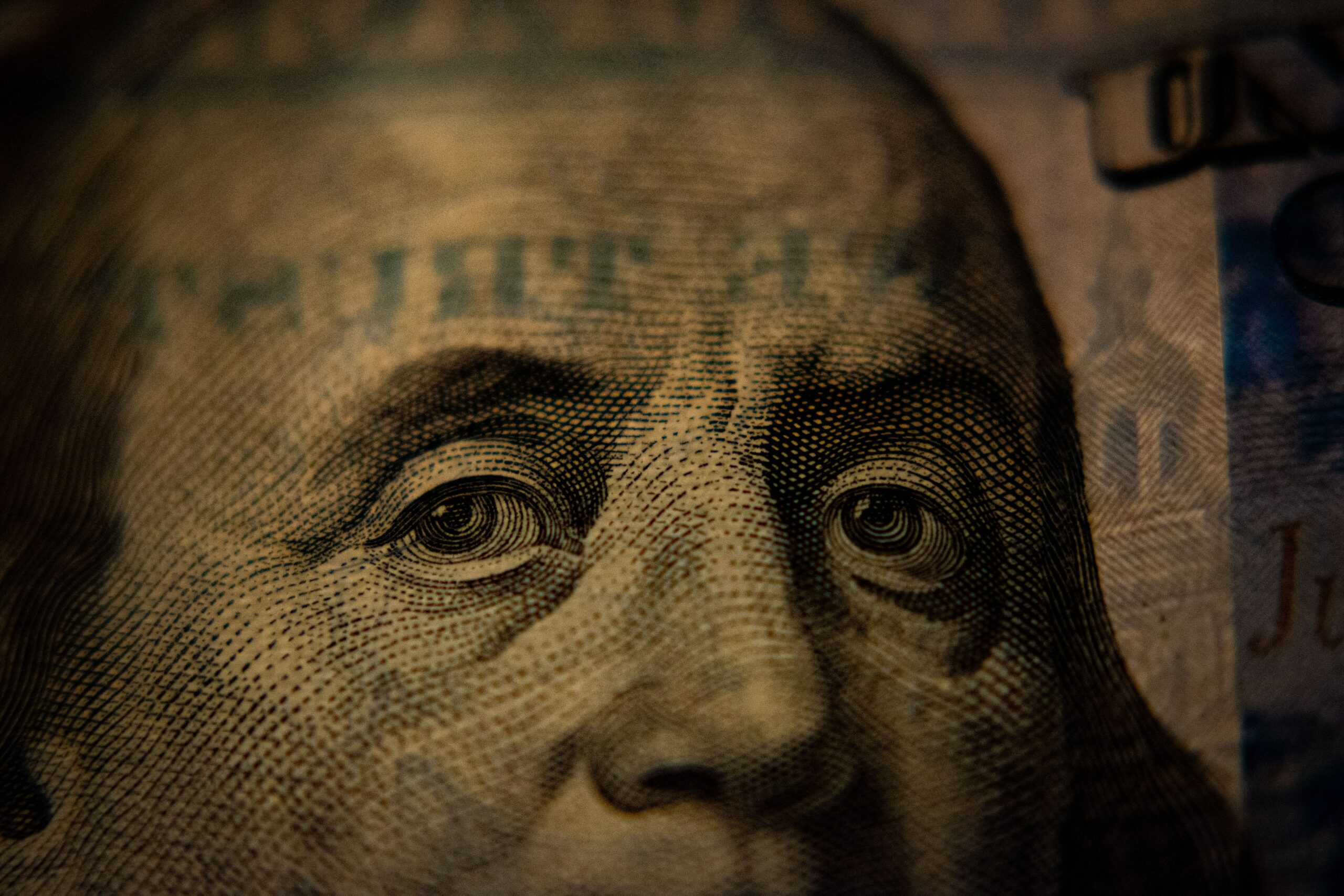 Ben Franklin on a $100 USD note.