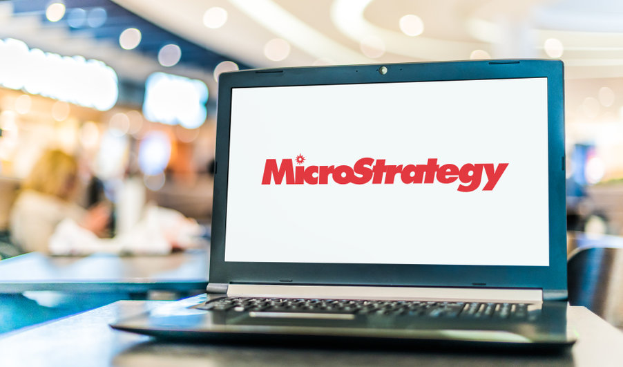 Laptop computer displaying logo of MicroStrategy Incorporated, a company that provides business intelligence (BI), mobile software, and cloud-based services.
