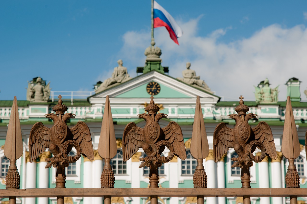 Russian building with Russian flag waving at top.