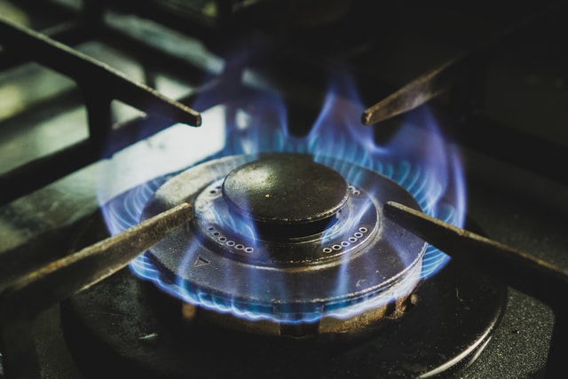 Image of a lit gas stove
