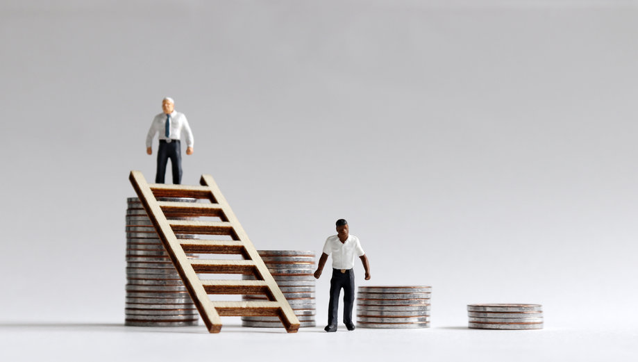 Image of man on top of ladder to represent income inequality