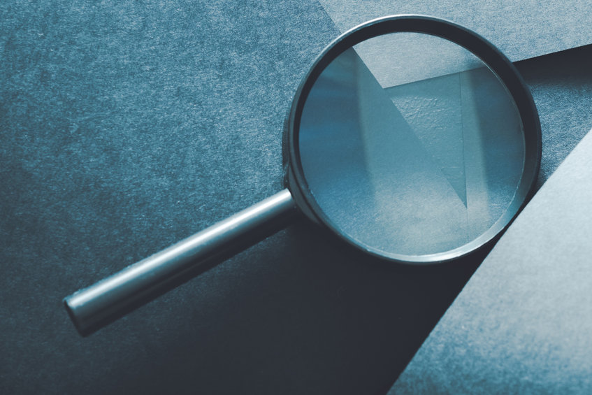 Image of a magnifying glass.