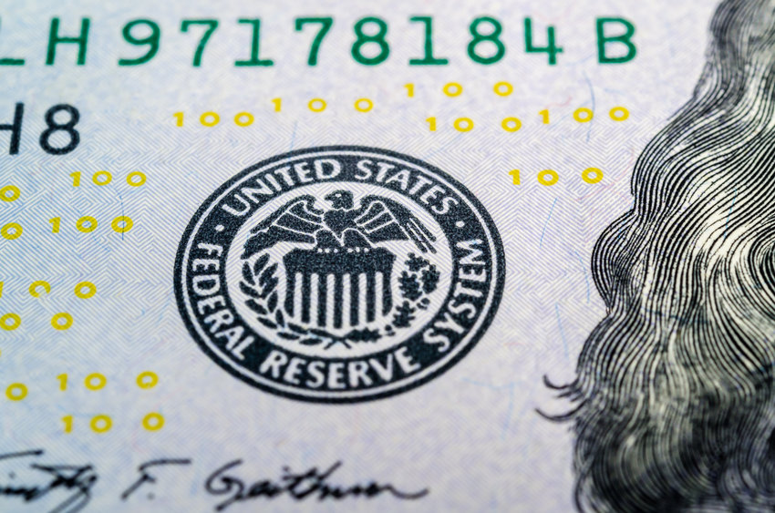Image of Federal Reserve seal on a dollar bill