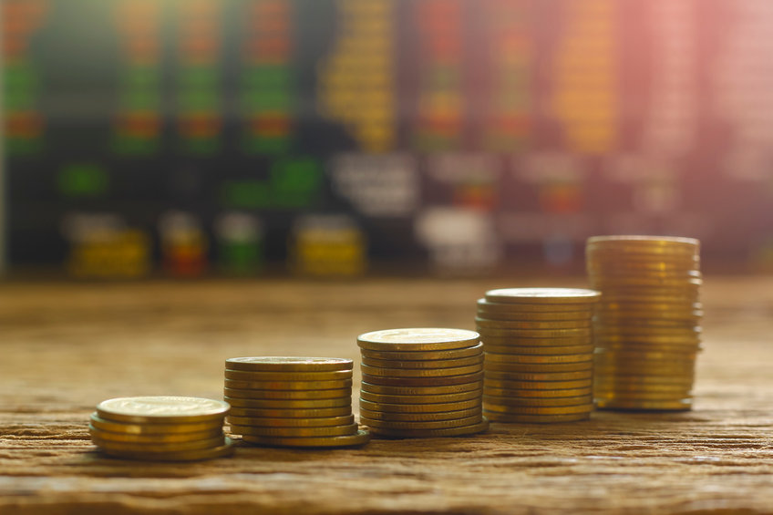 Image of rising piles of coins