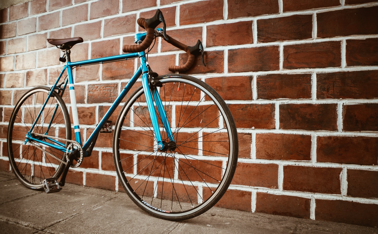 A bike leaning against the wall.