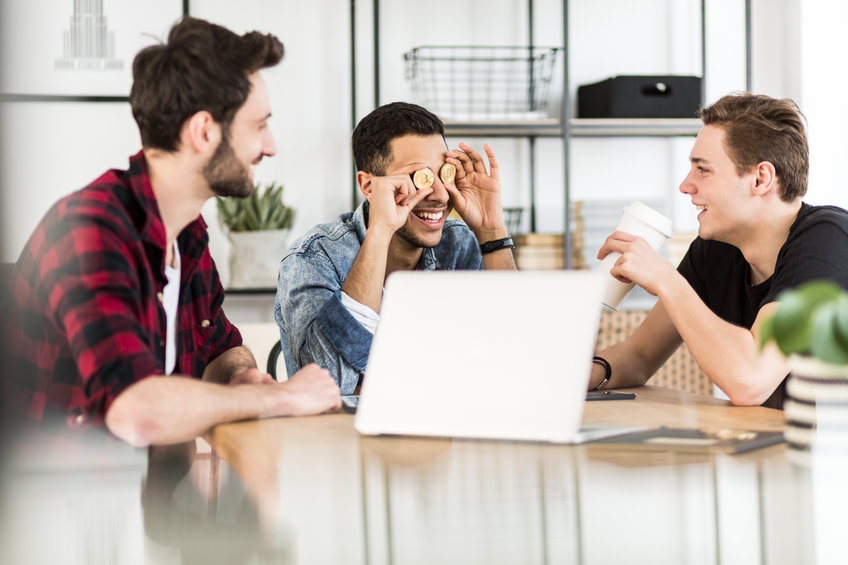 Image of young people on a laptop