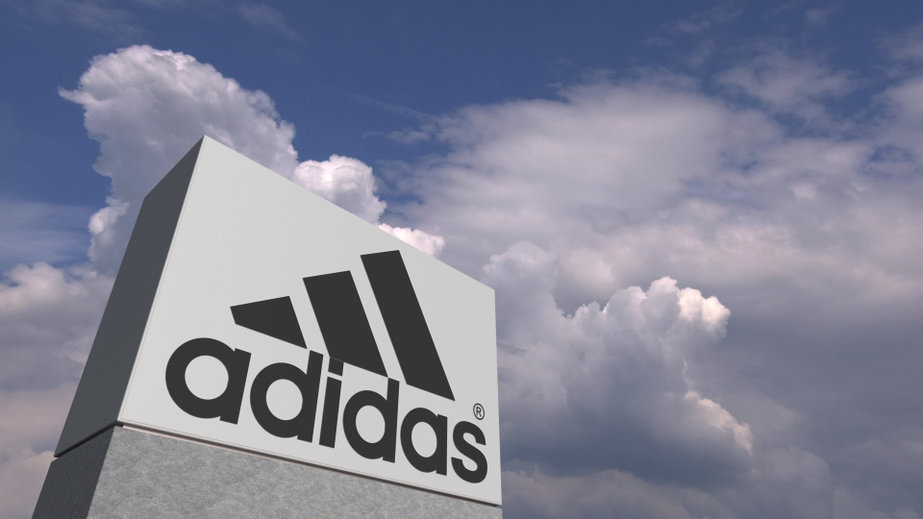 Adidas logo made against sky background