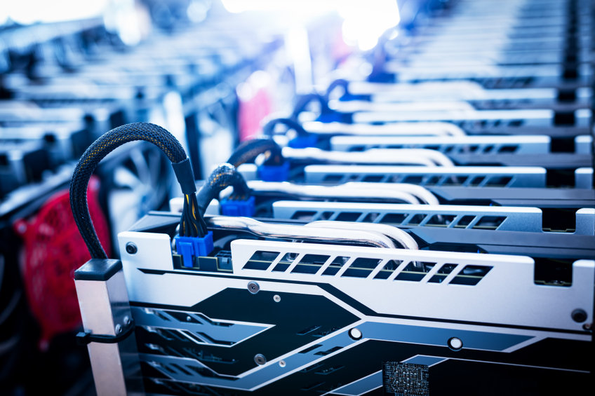 Picture of several ASIC bitcoin mining rigs manufactured by Canaan and located in Kazakhstan.