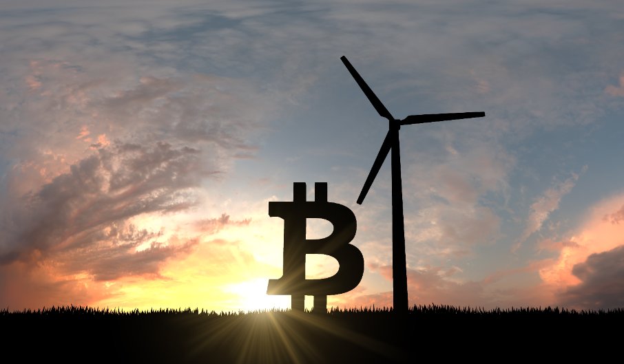 Bitcoin cryptocurrency logo silhouette with sustainable wind turbines