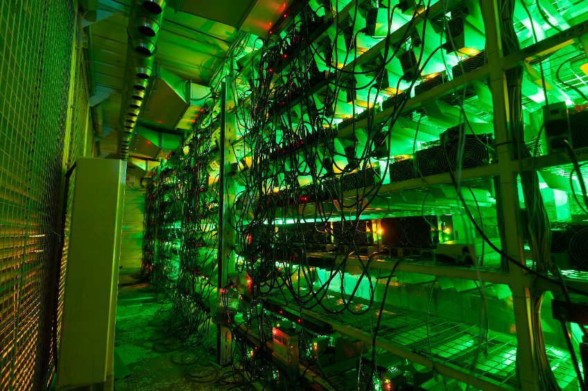 asic mining equipment on stand racks mine cryptocurrency in steel container