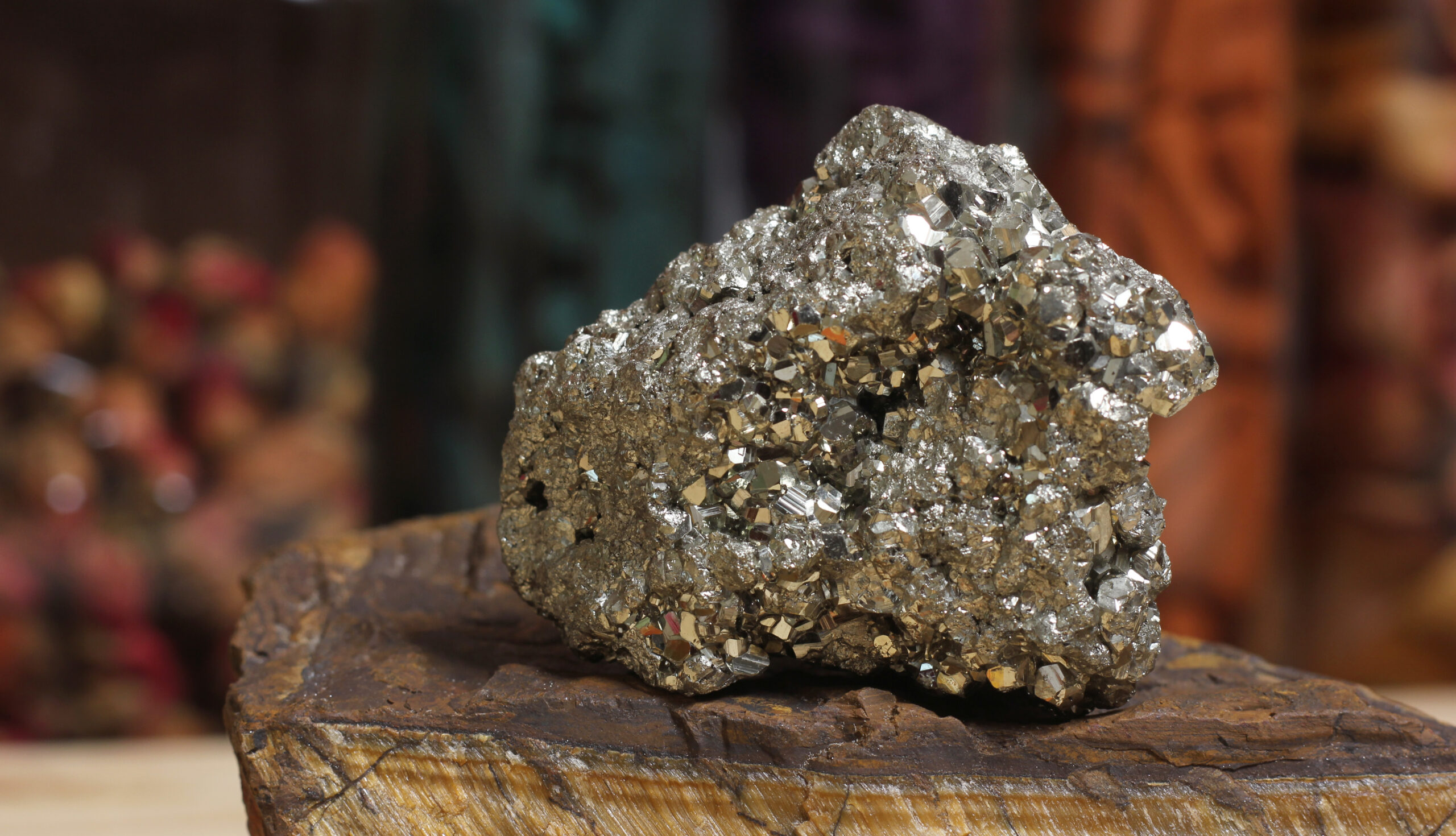 A Pyrite stone commonly known as "fool's gold" symbolizing the fact the tokens were not, despite what the issuers claimed, backed by gold.
