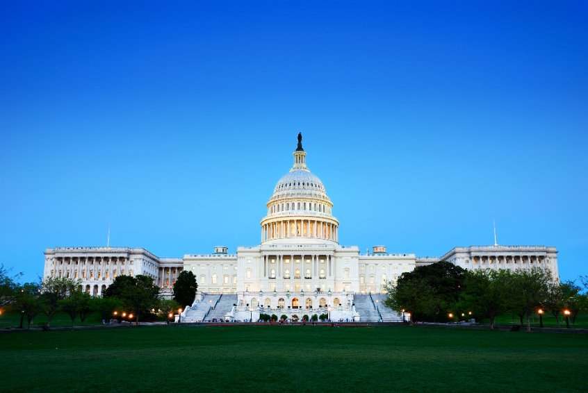 Capitol hill building at dusk with light and blue sky, washington dc.