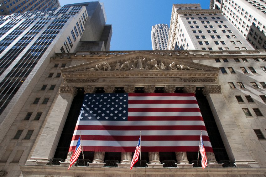 A large flag flies over the main building overlooking St Broad Street, under which brokers parade dressed from side to side of the street