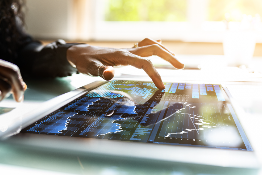 Stock Market Broker Using Tablet With Online Graph