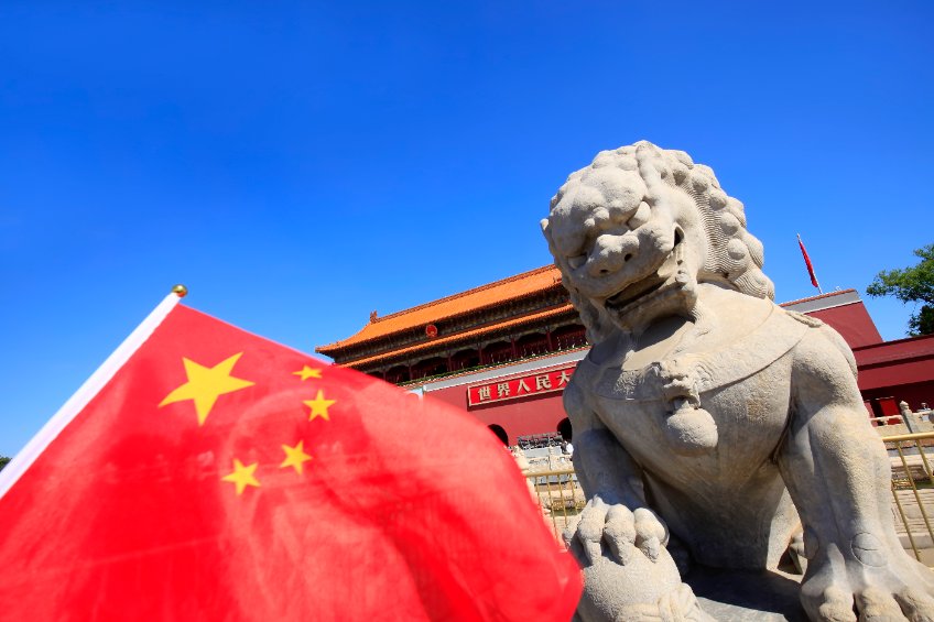Tiananmen square in front of the stone lion in Beijing, China
