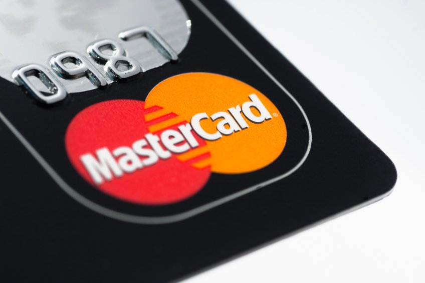 A close up macro shot of a Mastercard credit card.