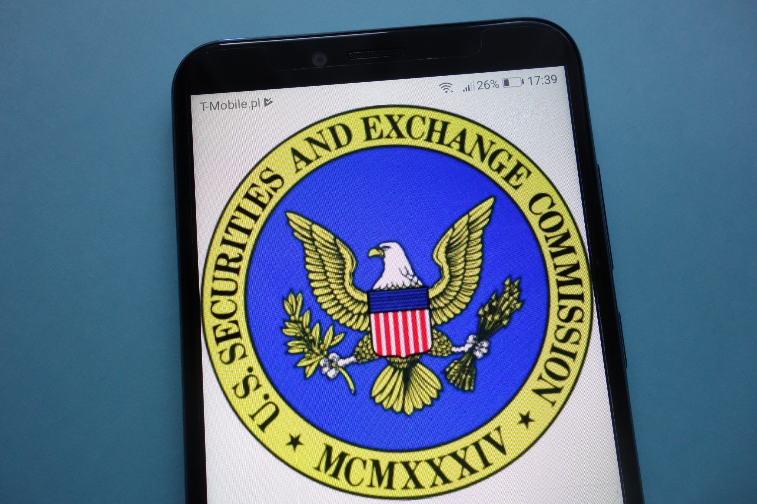 SEC seal on phone screen.