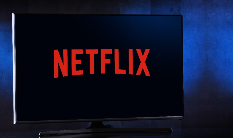 Flat-screen TV set displaying logo of Netflix