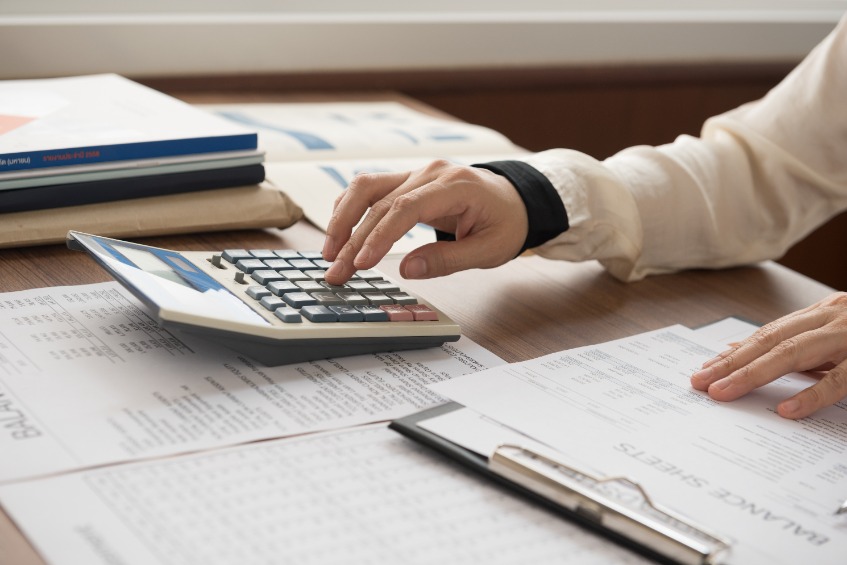 bookkeeper inspector calculated and checking balance accounts